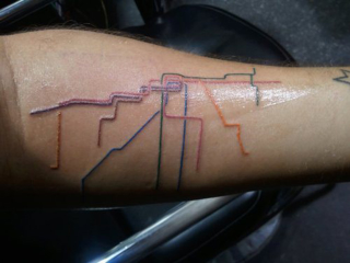 Illustration for article titled 11 Map Tattoos That Pay Tribute to Cities and Their Systems